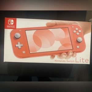 BRAND NEW nintendo switch lite COLOR: CORAL